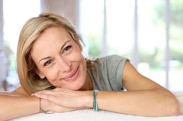 Older woman with healthy skin and smiling